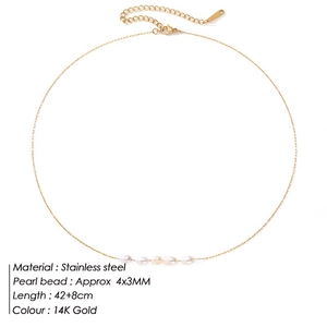 Stainless steel 14K gold necklace with fresh water pearls on a white background