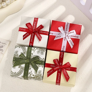 Elegant square jewelry gift boxes with satin bows in four assorted colors and textures