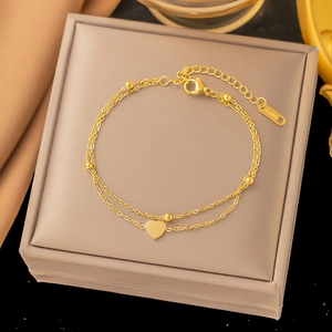 Double-layered golden stainless steel heart pendant bracelet with small round beads
