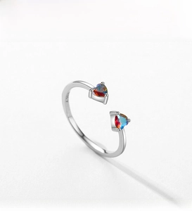 Detail of S925 silver ring featuring heart-shaped gradient zircon and open design