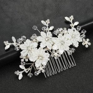 Handmade bridal hair comb with white pearl flowers and silver crystal beadwork