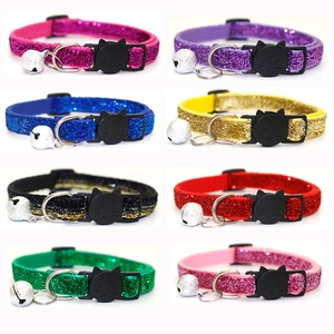 Grid view of glitter fabric pet collars with cat-shaped buckles and bells in eight colors