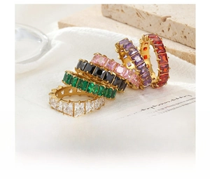 Detailed close-up of colorful square zircon stone rings in gold-plated titanium steel