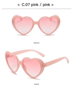 Detail view of pink heart-shaped sunglasses with gradient lenses in a multi-angle layout