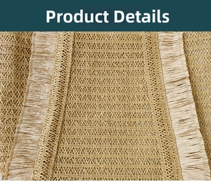 Close-up of hand-woven straw tote bag showing intricate mesh texture and fringe detail
