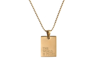 Gold rectangular pendant necklace with engraved World Is Yours slogan on bead chain