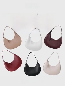 Multiple color options of half-moon leather handbags including burgundy and black colors