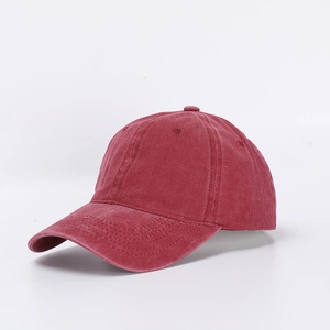 Classic washed burgundy cotton baseball cap shown from a 45-degree angle in studio