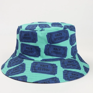 Detailed view of mint green bucket hat featuring navy blue NECY STUDIO ticket patterns