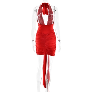 Detailed back view of a red halter neck dress with deep V-neck and ruffled back details