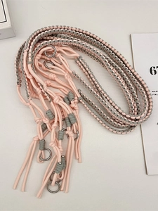 Adjustable hand-woven shoulder strap in pink and grey with round silver metal clasps