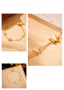 Detailed macro shot of a gold butterfly bracelet with matte finish and adjustable clasp