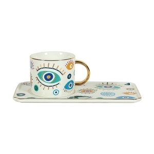 Modern ceramic evil eye coffee cup and saucer set with elegant gold rim and artistic pattern