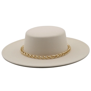 Elegant beige wide brim flat top fedora hat with a bold gold metal chain decoration