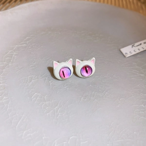Creative silver needle cat stud earrings with cosmic purple eyes and white enamel finish