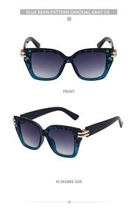 Detailsicht der eckigen Sonnenbrille mit blauem Bohnenmuster und grauen Verlaufsgläsern