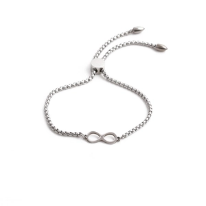 Detailed shot of silver infinity symbol bracelet with adjustable pull slider clasp
