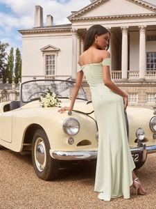 Elegant mint green off-shoulder slim fit maxi dress for women in a luxury outdoor setting