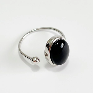 925 sterling silver punk ring with large oval black onyx stone and open adjustable band