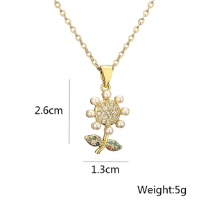 Detailed view of sunflower pendant dimensions showing 2.6cm height and pearl petals