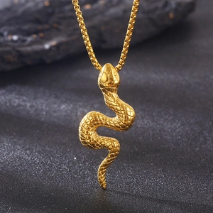 Detailed close-up of 3D gold snake pendant with textured scales and polished metal finish