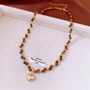 Retro 18k gold plated tiger eye beaded necklace with a heart pendant and crystal center