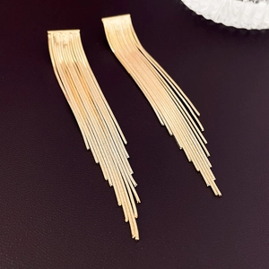 Elegant gold long tassel earrings with metallic chains for a sophisticated women's look
