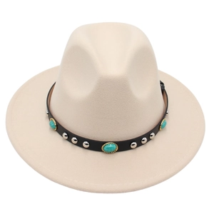 Detail of beige fedora hat featuring black leather band with turquoise and metal studs