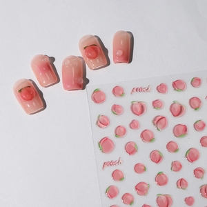 3D peach nail stickers with jelly texture and pink water drop design on white background