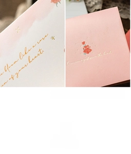 Detail of pink 3D flower greeting card with gold foil roses quote and premium texture