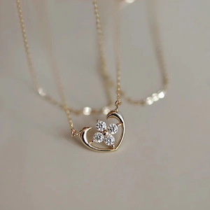 Classic 925 sterling silver heart necklace with gold plating and clover zircon details