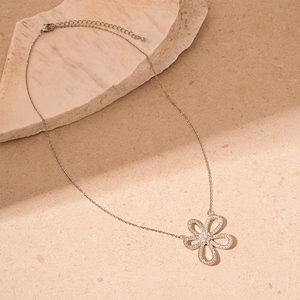 Detail of s925 silver hollow flower necklace featuring sparkling zircon pave settings