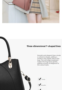 Détail d'un sac à main en cuir noir texturé avec finitions dorées et design en T