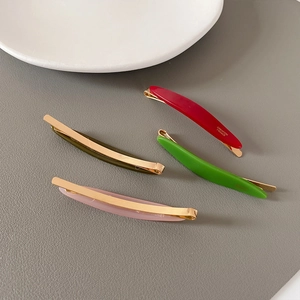 Minimalist acetate hair clips in candy colors including red, green, and pink for women