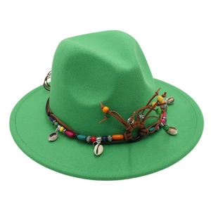 Detail of green wool fedora with bohemian beads, woven leather cord and small shells