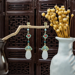 Detailed view of Chinese vintage long tassel earrings with blue enamel and teardrop pearls