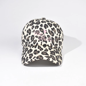 Detailed view of leopard print baseball cap with pink Ciau Bella embroidery and curved brim