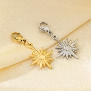 Minimalist gold and silver star pendants with lobster clasps on champagne silk