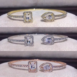 Adjustable zircon open bangle set in gold, silver, and rose gold with geometric stones