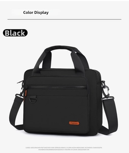 Detail of black business briefcase featuring durable nylon handles and adjustable strap
