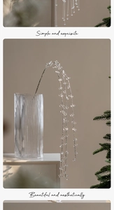Exquisite crystal beaded branch decoration in a textured glass vase for holiday decor