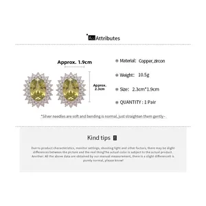 Detail view showing oval yellow zircon earring dimensions and material specifications