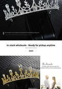 Detail of a silver bridal crown featuring zircon leaves and large pear-shaped crystals