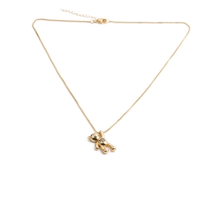 Golden teddy bear pendant necklace with sparkling zircon crystals on white background