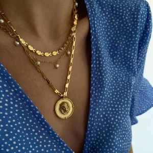 French style layered gold titanium necklace with pearl accents and lion head pendant