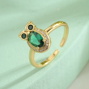 Gold-plated owl open ring with a green oval gemstone and clear zircon accents