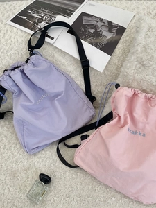 Lightweight nylon drawstring backpacks in lavender and pink for outdoor commuting and travel