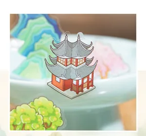 Detail of 3D landscape stickers featuring traditional Chinese towers and green mountains