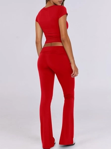 Rear view of vibrant red short-sleeve top and flared trousers slim-fit two-piece set