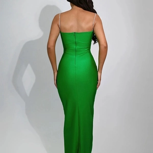 Detail view of the green backless evening dress with back zipper and slim fit design